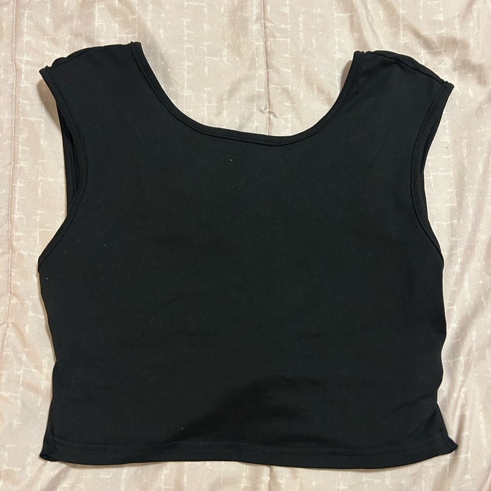 Backless black tank with a tie in the back